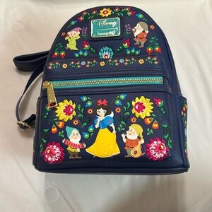 Brand new Loungefly Snow White and the seven dwarfs back pack.